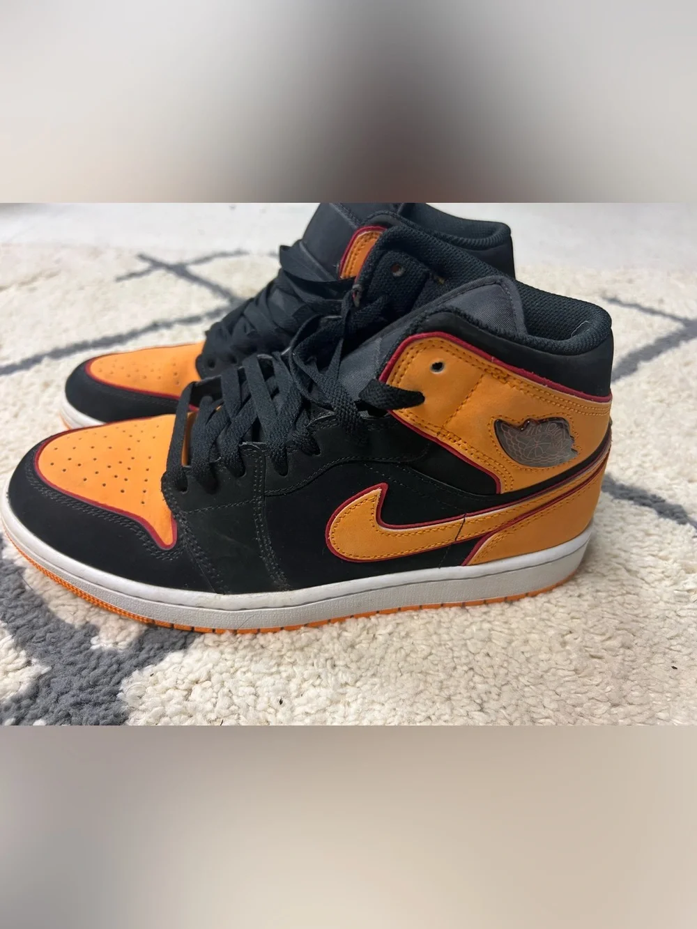 Air Jordan Orange High-Top Sneakers with Black Trim
